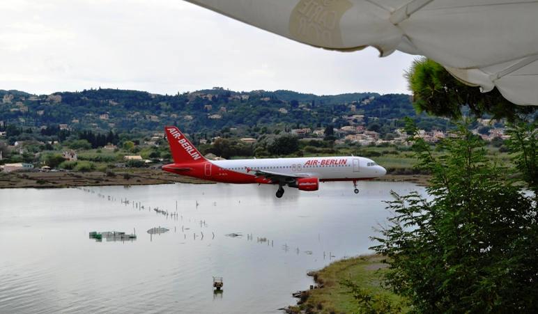 The plane lands at Corfu airport